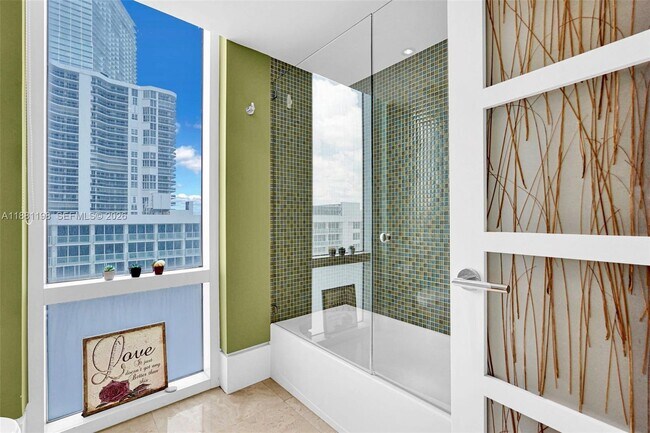 Building Photo - 16699 Collins Ave