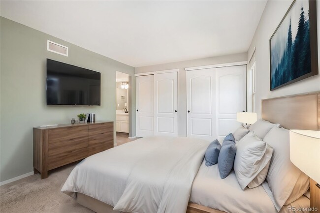 Master bedroom. Huge double sliding closets! - 701 Harlan St