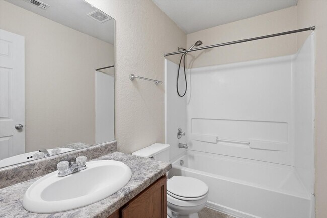 Building Photo - 4BR Home with Open Living Area & Included Appliances