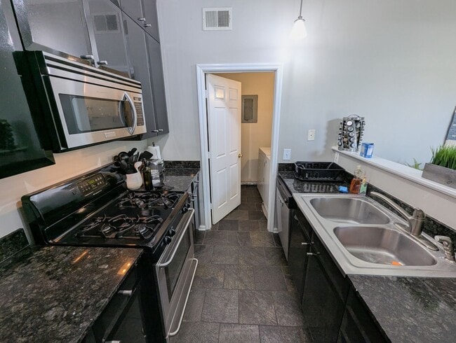 Building Photo - Fully Furnished Shaw Sanctuary