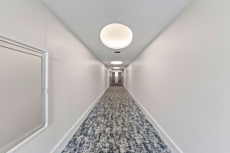 Hallway to unit - 1111 N Gulfstream Ave