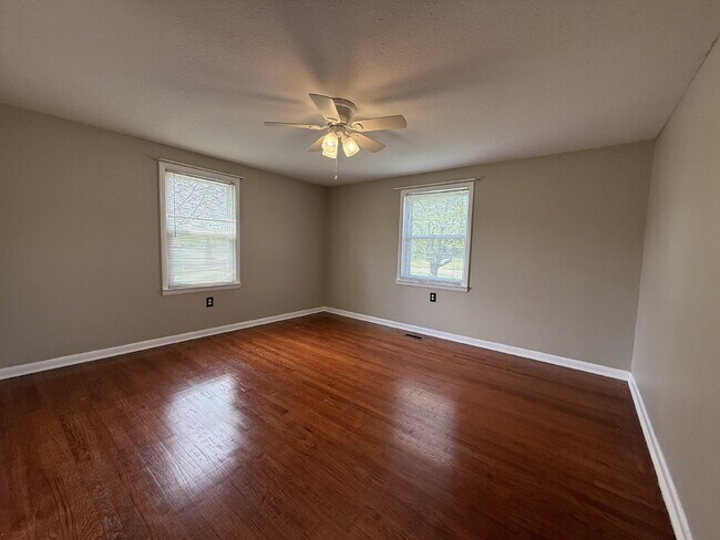 Building Photo - Will consider Section 8 "Charming 4-Bedroom Home with Hardwood Floors on Ready Section Road!"