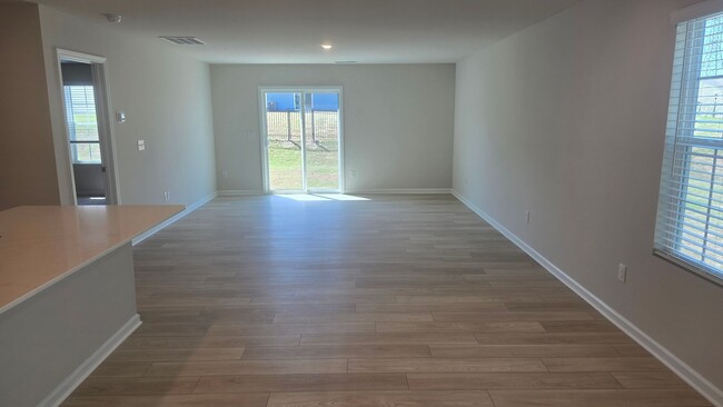Building Photo - New Home with 5BR/2.5BA, Loft Area, Primar...