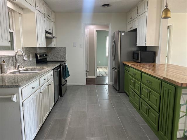 Building Photo - 7720 Gaston Ave