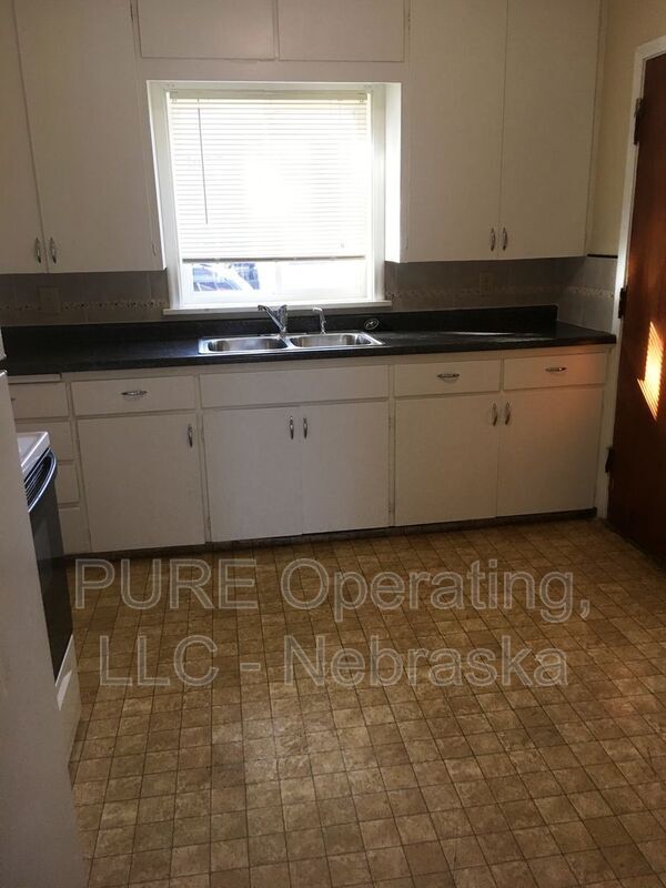 Building Photo - 210 N 32nd Ave