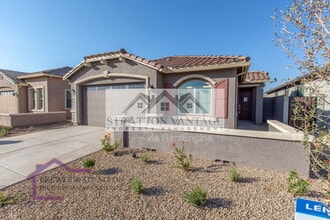 Building Photo - 9638 E Tesla Ave