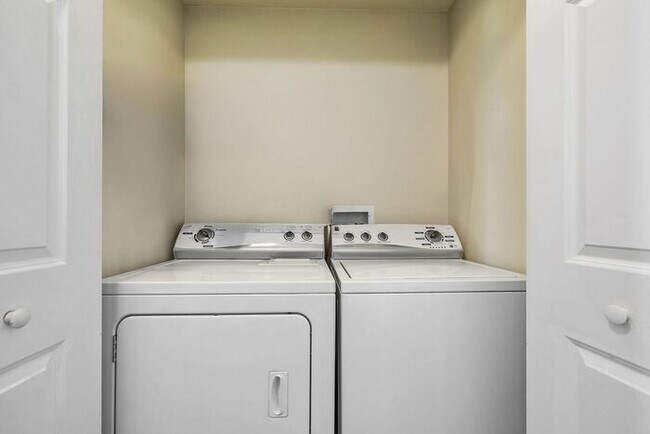 Building Photo - Bright & Spacious 2BR/2BA Condo with Covered Parking Near Train Station