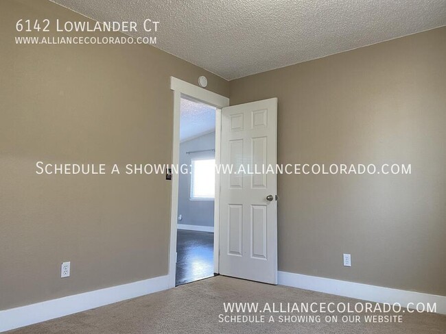 Building Photo - 6142 Lowlander Ct