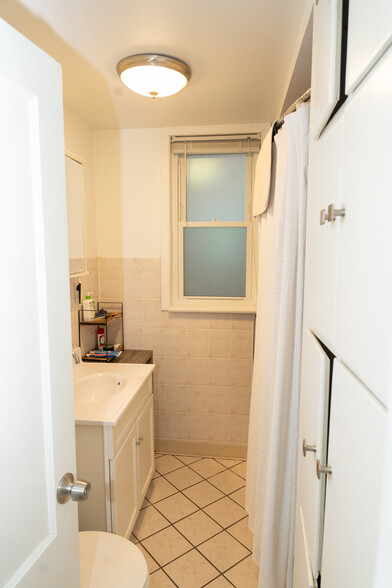 Bathroom with vanity, tub/shower, bathroom storage - 3350 W Cuyler Ave