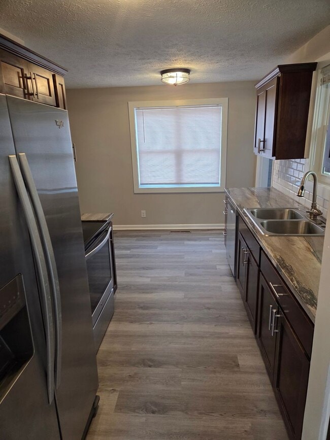 Building Photo - 3 bed, 1 bath, 1 car garage with fenced in backyard. District 66, right next to Aksarben!