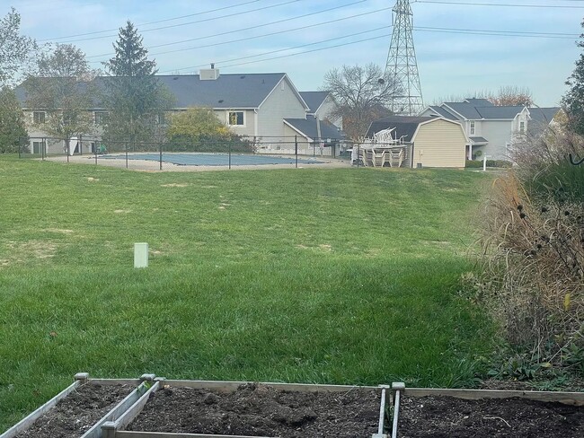 swimming pool from back yard - 706 Sherwood Green Ct