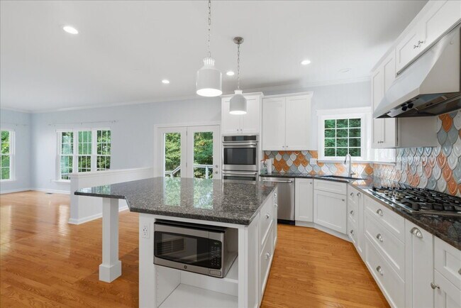 Building Photo - Spacious Broadlands Home Backing to Nature with Expansive Outdoor Living