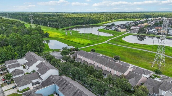 Building Photo - MOVE IN SPECIAL- 3/2.5 Townhome W/ 2 Car Garage For Rent in the Highly Desirable Avalon Park Comm...