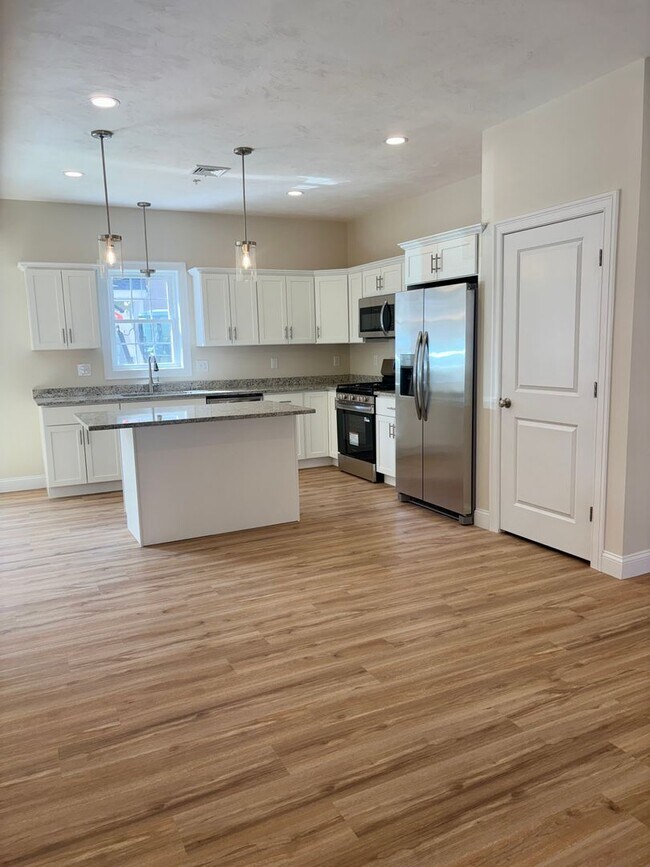 Building Photo - Brand New Townhouse-Style Living with Modern Finishes