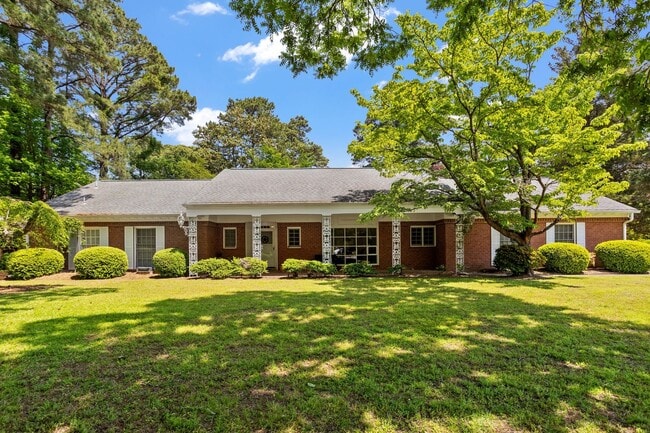 Primary Photo - Beautiful brick home on a 1-acre lakefront...