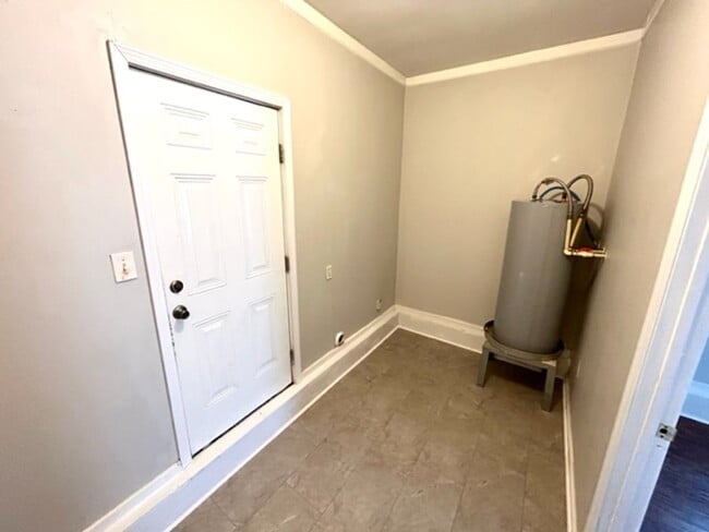 Building Photo - THREE BEDROOM ONE AND HALF BATH BRICK RANCH HOME