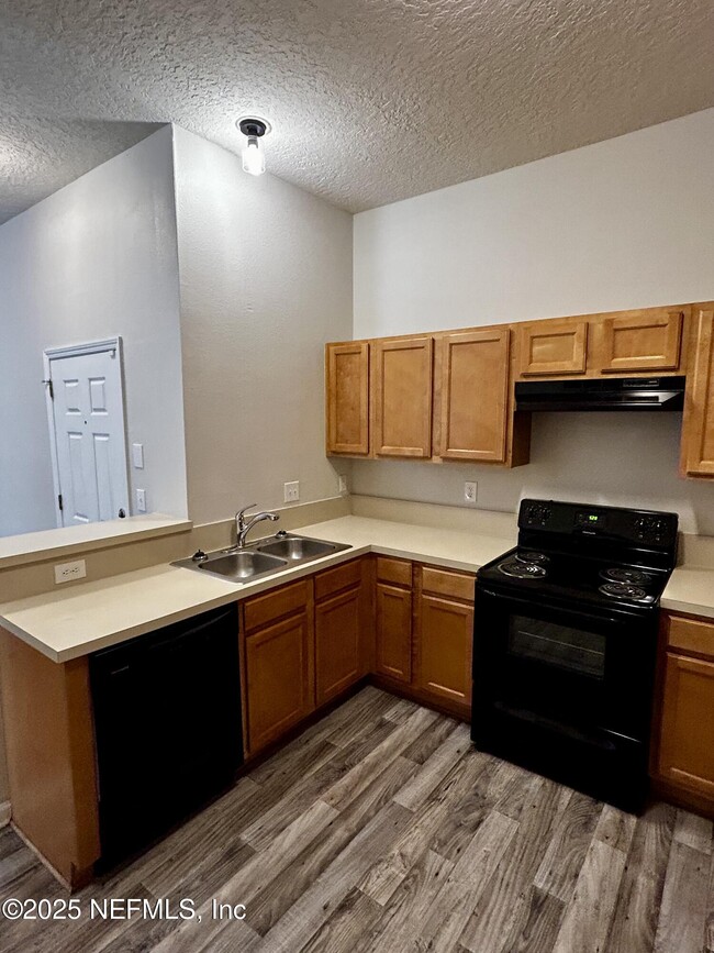 Building Photo - 6788 Manotak Oaks Dr