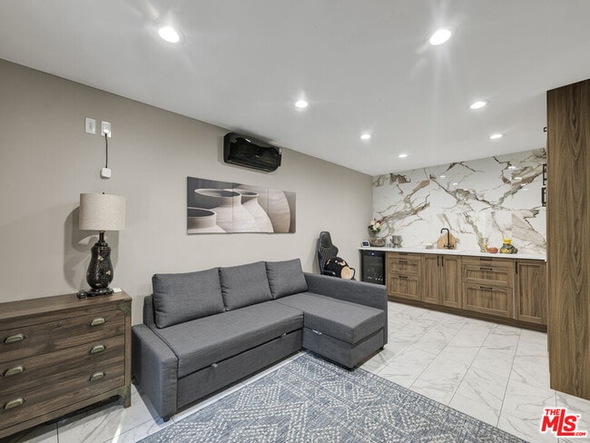 Building Photo - 6842 Ranchito Ave