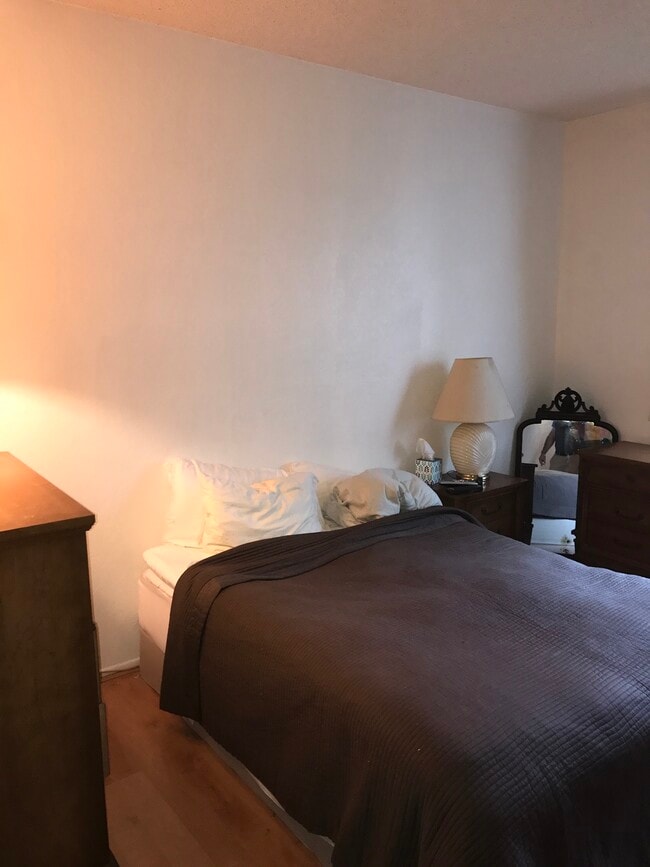 Large Bedroom with access to Patio - 8500 Falmouth Ave