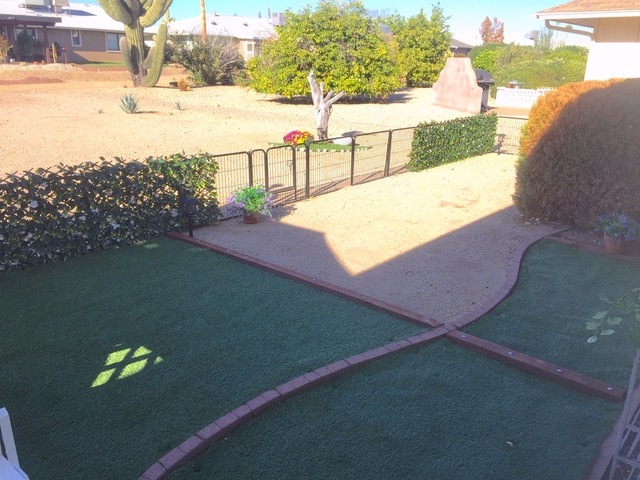 Attached pet pen area with feet pleasing, no maintenance artificial turf. - 12414 W Nugget Ct