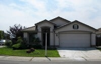 Building Photo - 3 Bed, 2 Baths, 1485 SF. 2 Car Garage, sin...