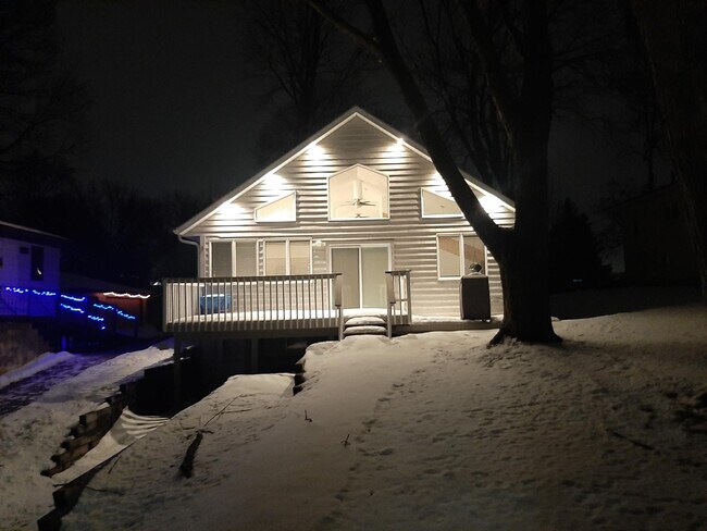 EVENING VIEW OF BACK DECK - 4301 Quaker Trl NE