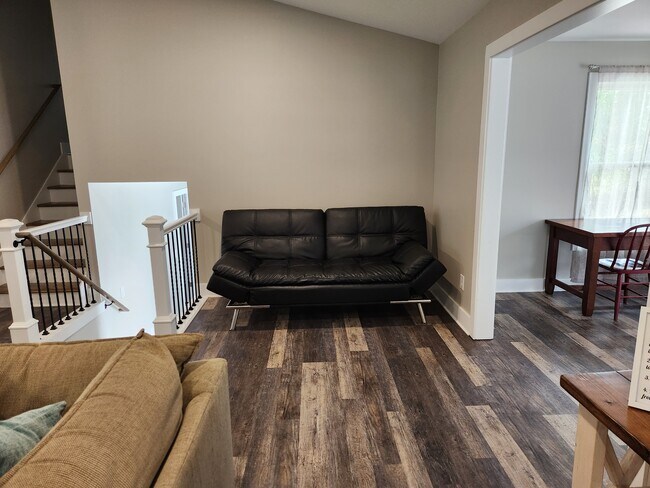 Futon in Living Space - 1800 Cumberland Trce