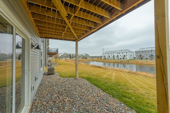 Building Photo - Awesome maple grove 5 bed 4 bath townhome! Pond views, 2 years old!