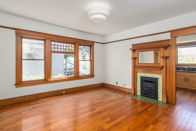 dining room with view of windows and fireplace - 847 E Kensington Rd