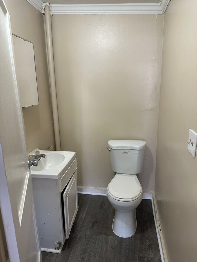 Building Photo - Four-Bedroom Bungalow with Fenced Yard Near Downtown Durham!