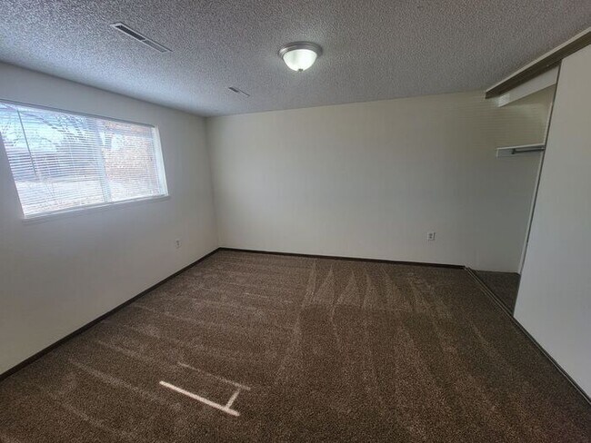 Building Photo - Great 2 Bedroom/1 Bath Duplex with 1 Car Attached Garage in Northeast Loveland, CO