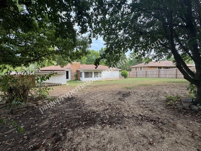 Building Photo - Charming 3 Bedroom, 2 Bath Home with Sunroom, Garage & Privacy-Fenced Yard