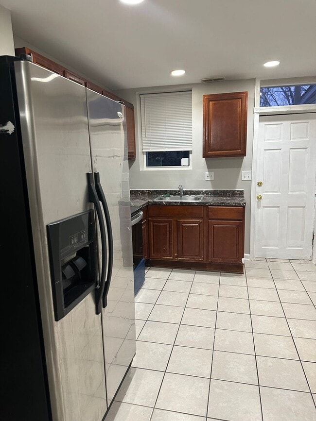 Building Photo - Spacious, Newly Renovated Home! Central Air! Finished Basement! W/D! Double Level Rear Deck! Avai...