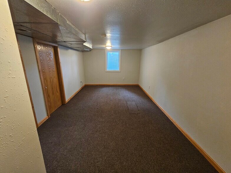 Basement finished room. - 606 Tindolph Ave S