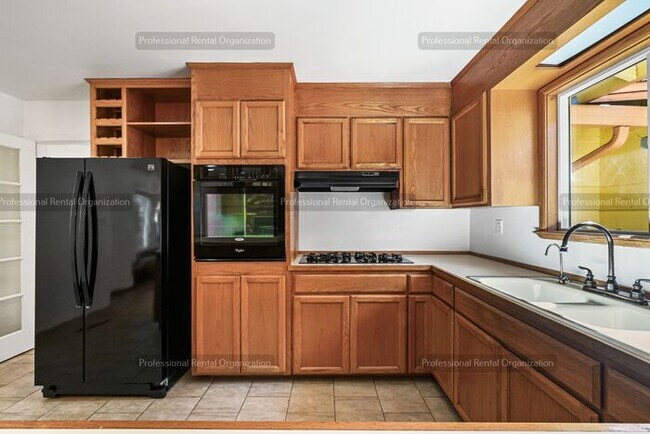 Building Photo - Look No Further, this home has it all- Hot Tub, Sauna, EV Charger, Solar, KOI Pond & More