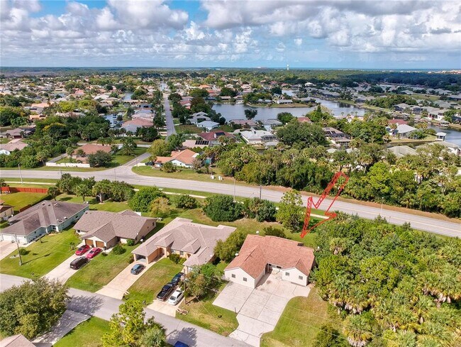 Building Photo - 100 Coral Reef Ct N