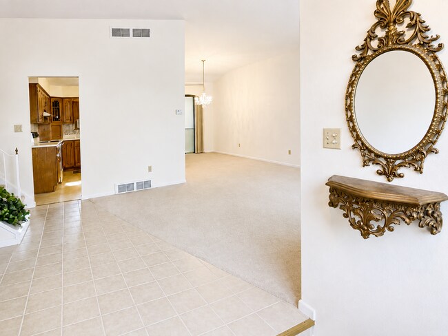 Building Photo - Spacious 3-Bedroom Split-Level with Formal Dining Room, Fireplace, and Fenced Backyard