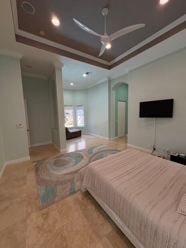 Building Photo - Spacious 3/3.5 3 car garage home in Palm City