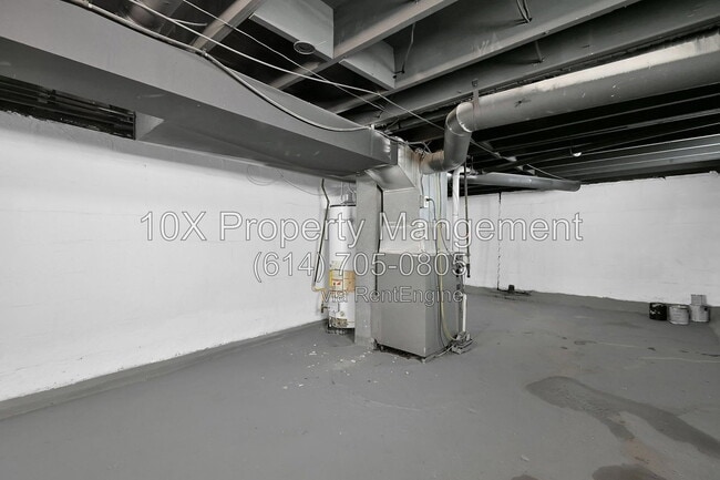 Building Photo - 1311 E 24th Ave
