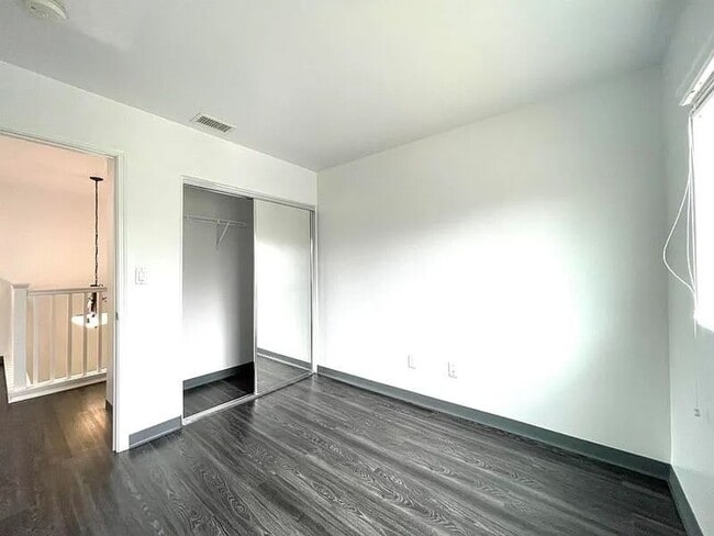 Building Photo - A stunning two-story house boasts three spacious bedrooms and 2.5 bathrooms