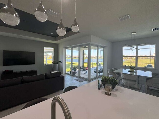 Building Photo - Modern 3-Bedroom Home with Pool and Lake View
