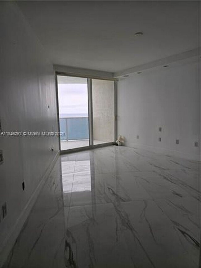 Building Photo - 19111 Collins Ave