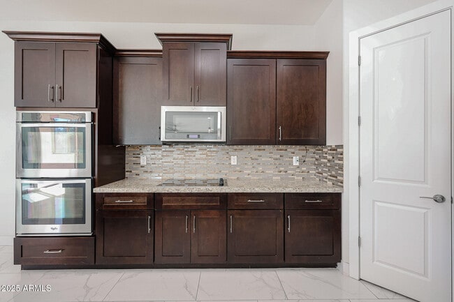 Building Photo - 6327 E Dixileta Dr