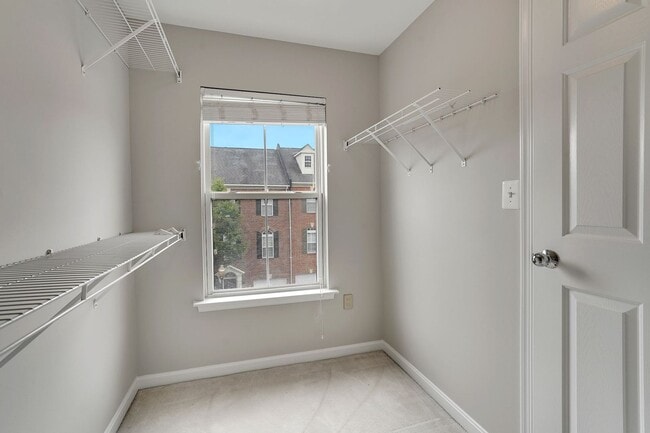 Building Photo - COMING SOON - Great 4 level end unit TH in...