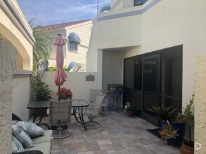 Building Photo - Experience the Gated Waterfront Community,...