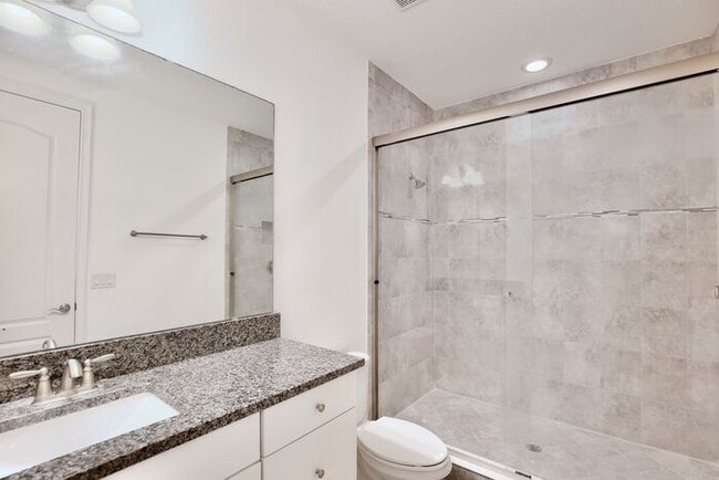 Building Photo - Elegant 2/2.5 Townhome in Guard-Gated Eagl...