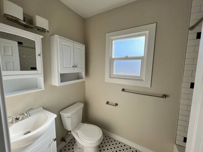 Building Photo - Life is Better at the Beach! 1+1 Upstairs Cottage