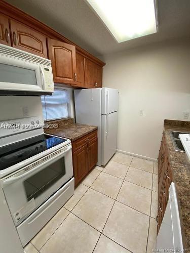 Building Photo - 8560 N Sherman Cir