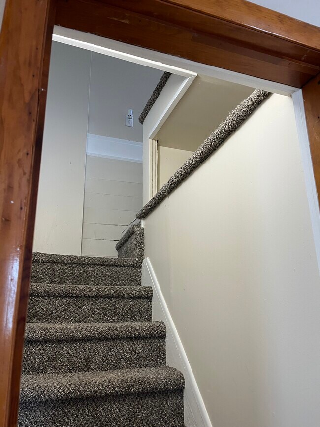 Staircase w/ storage cubby - 204 New Boston St