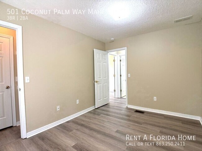 Building Photo - 501 Coconut Palm Way